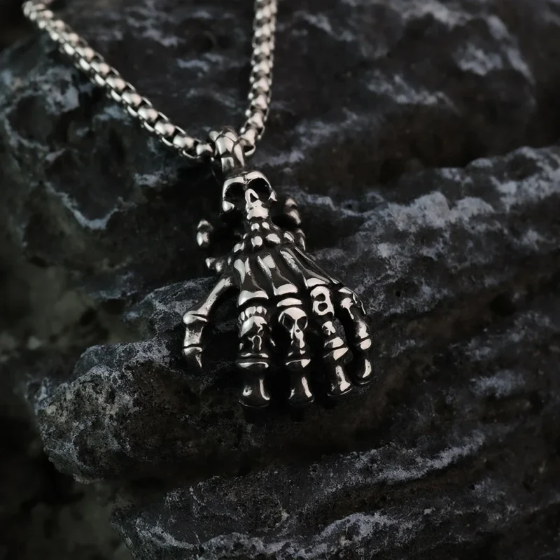 Skull hand pendant