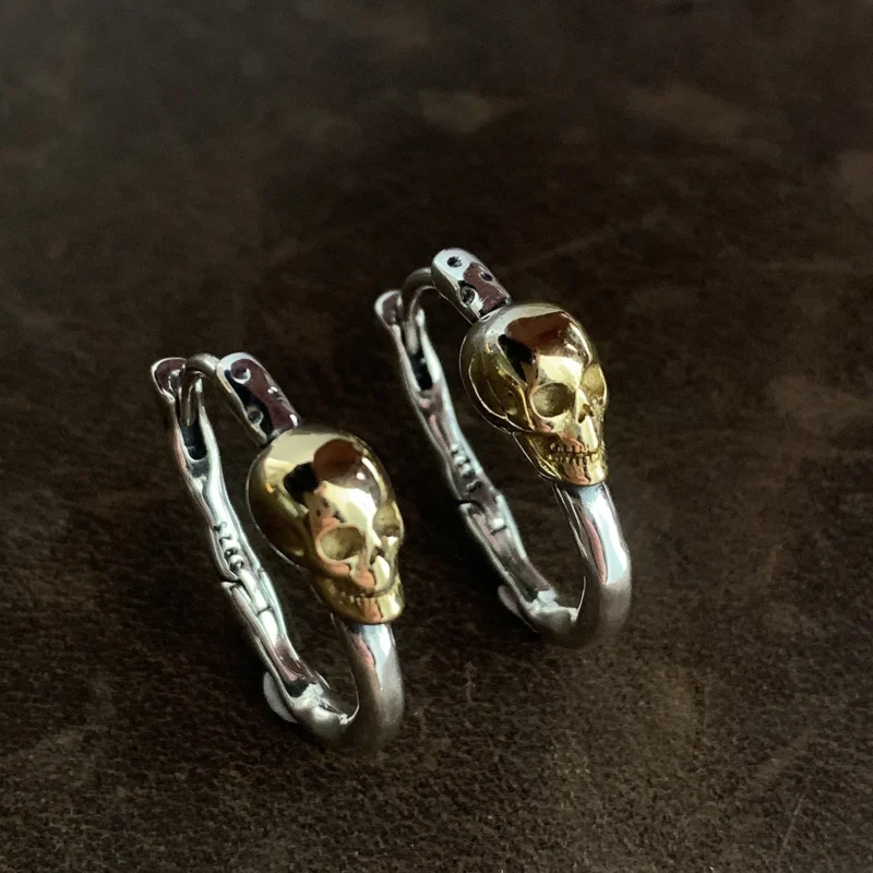 Small skull creole earrings